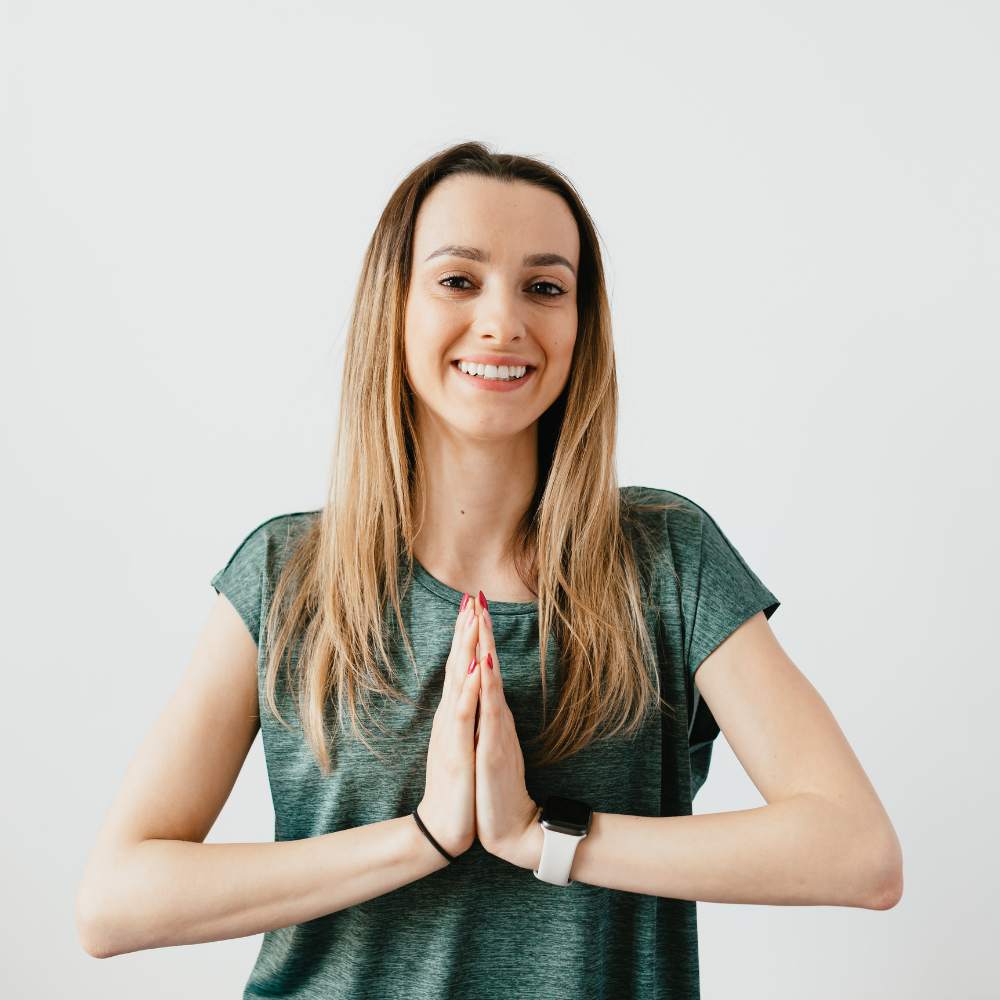most traditional greeting is placing your palms together in a prayer-like gesture and giving a slight bow while saying "Namaste."